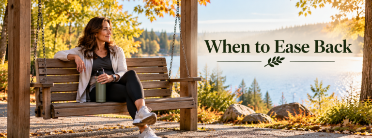 Claire relaxes on a wooden bench swing overlooking a peaceful lake, holding a water bottle in the warm autumn sunlight. The image reads “When to Ease Back.”