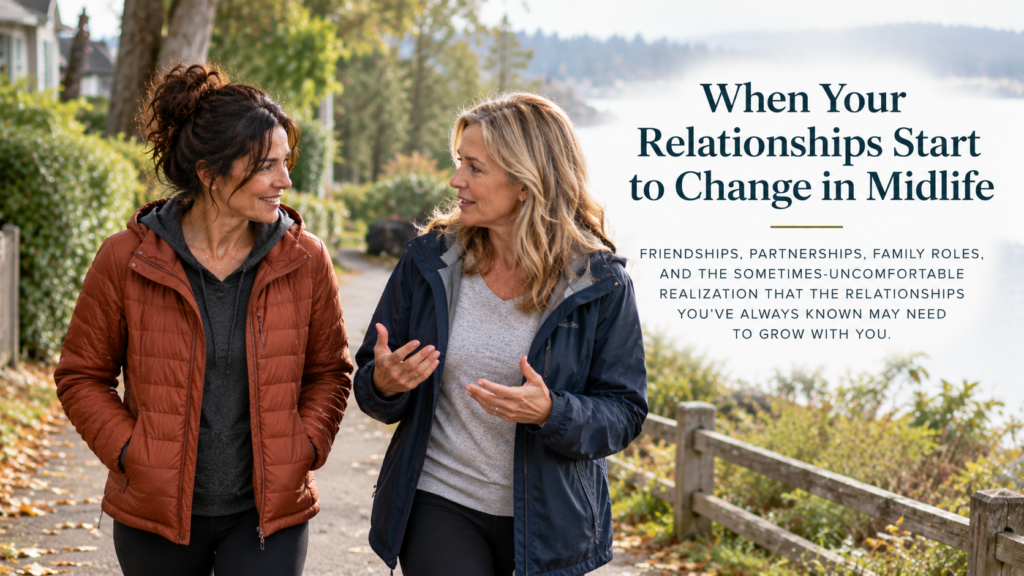 Two middle-aged women in rust and navy jackets walk together along a tree-lined waterfront path, talking in a natural early-autumn setting. The header includes the title “When Your Relationships Start to Change in Midlife” and its subtitle about evolving friendships, partnerships, and family roles.