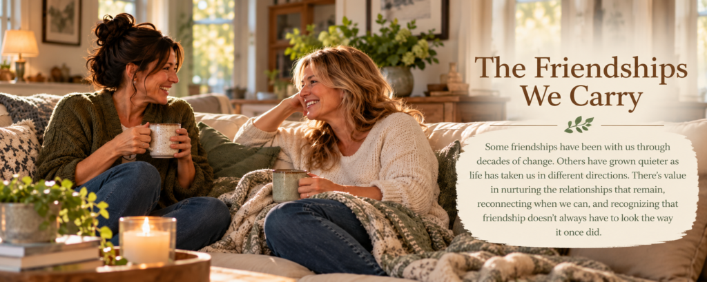 Two middle-aged friends smile over coffee on a cozy living room sofa, with the title “The Friendships We Carry” and introductory text embedded on the right.